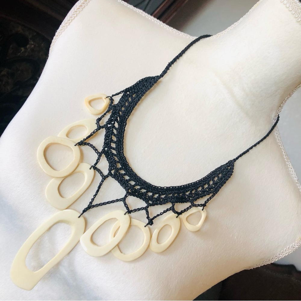 Handcrafted crochet simulated bone disc necklace